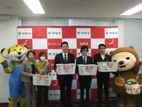 写真：会場での記念撮影の様子