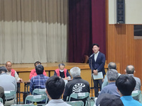 写真：会場での挨拶の様子