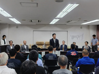 写真：会場での挨拶の様子