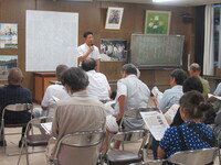 写真：会場での挨拶の様子
