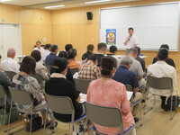 写真：会場での挨拶の様子