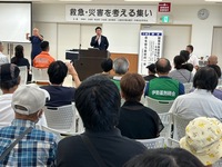 写真：会場での挨拶の様子