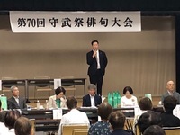 写真：会場での挨拶の様子