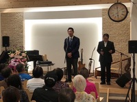 写真：会場での挨拶の様子