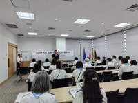 写真：会場での挨拶の様子