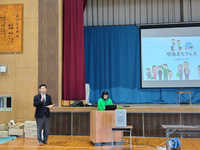 写真：会場での挨拶の様子
